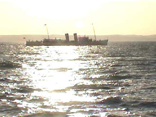  The Waverley sailing away
 in a liguid gold evening Sun 